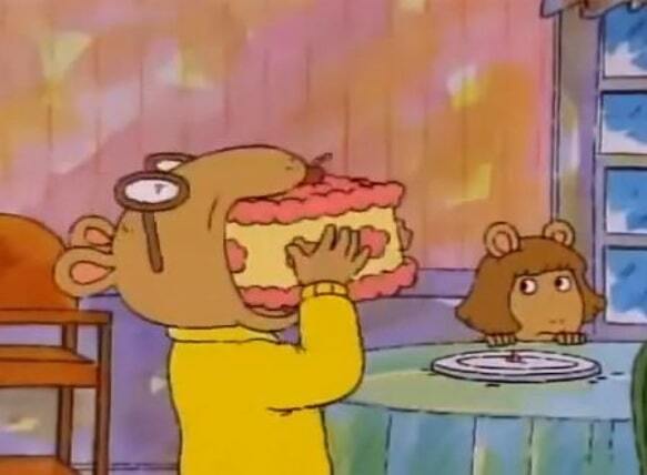 Arthur eating a giant cake in one bite