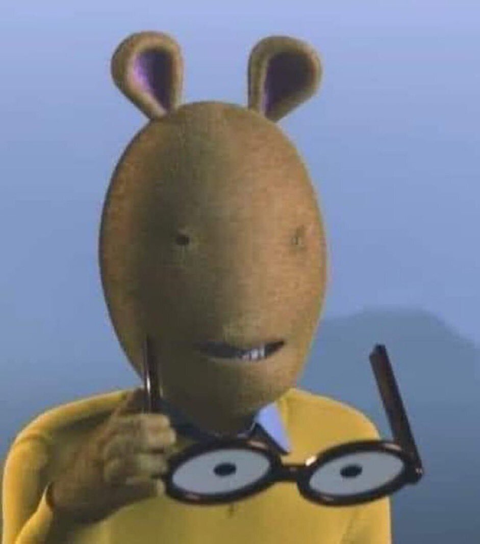 Arthur the Aardvark pulling his eyes and glasses off his face