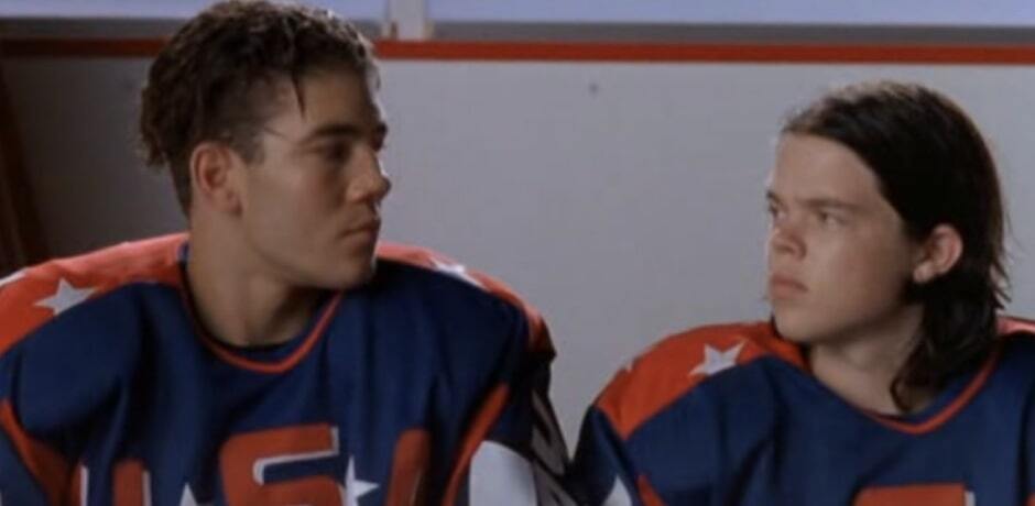 The Bash Brothers from Mighty Ducks looking at each other