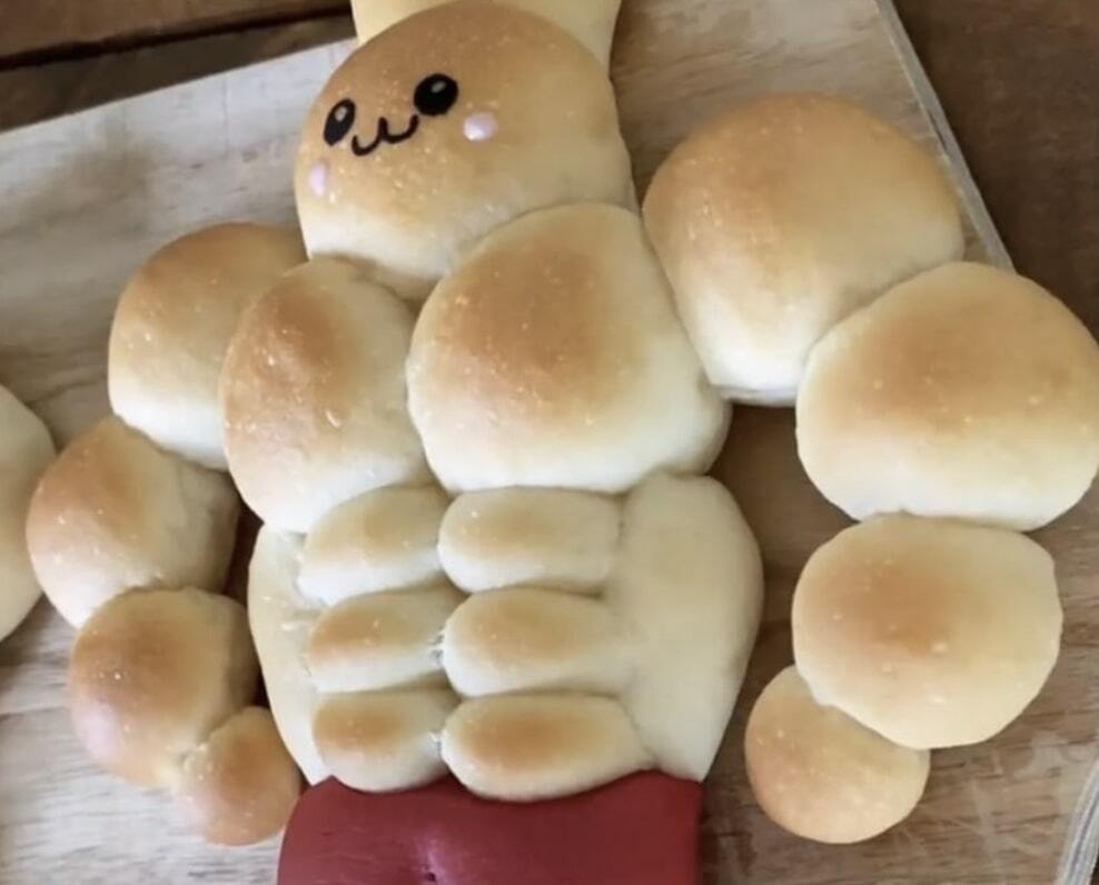 dinner rolls in the shape of a buff bunny