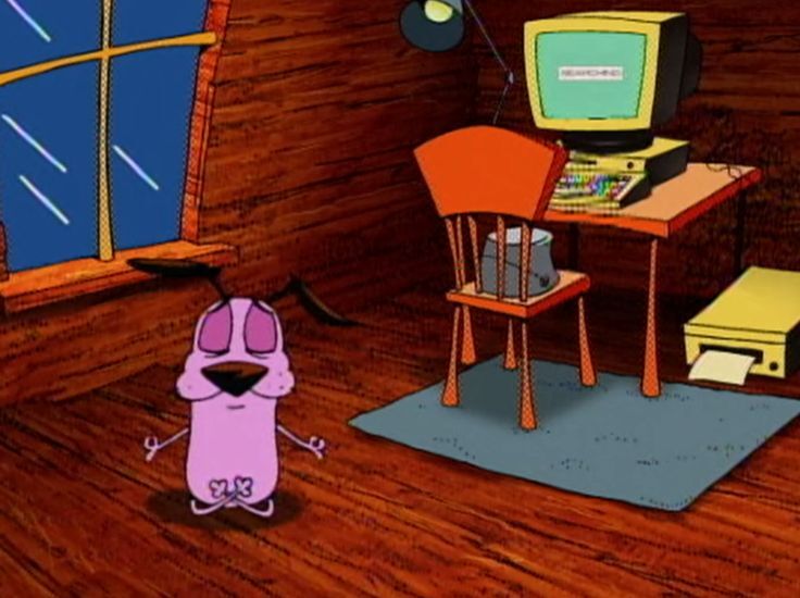 Courage the Cowardly dog meditating in front of his computer