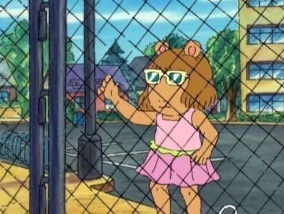 DW from Arthur standing outside a fence looking sad