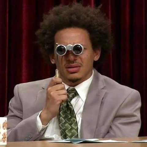 Eric Andre holding old-fashioned binoculars