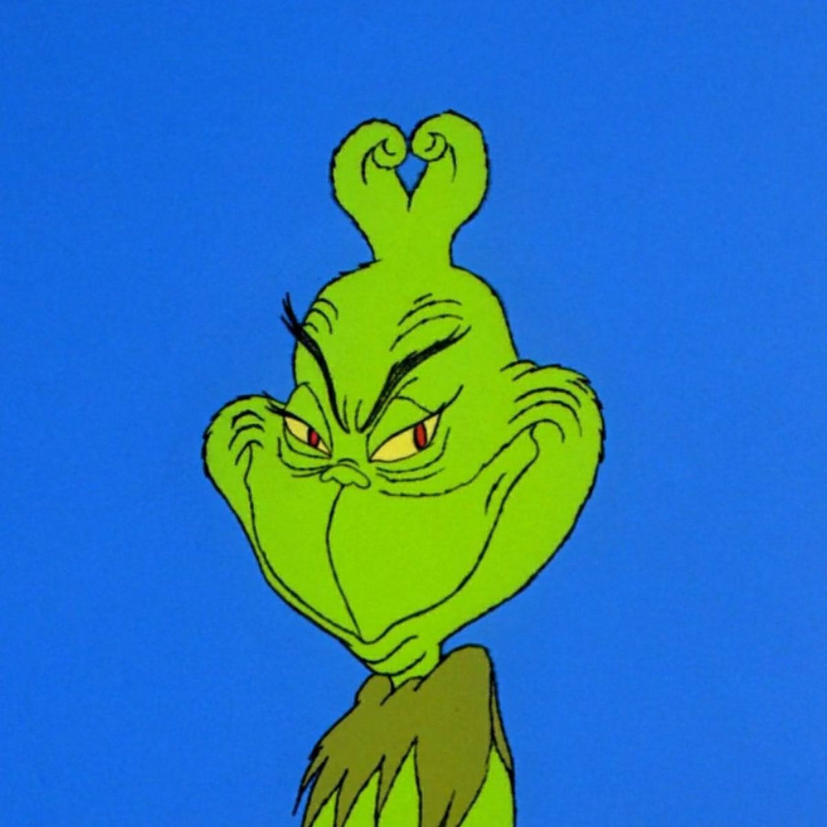 Grinch smiling mischievously