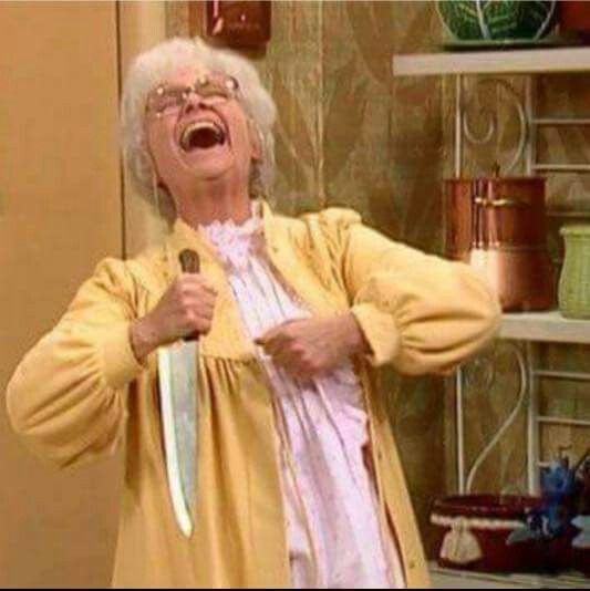 Old lady from Golden Girls laughing while holding a knife