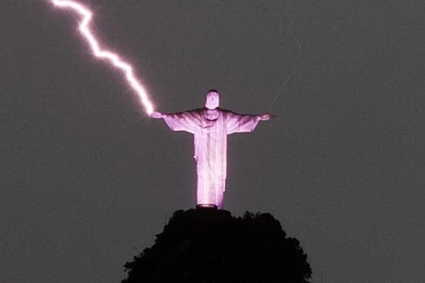 Christ the Redeemer statue getting struck by lightning