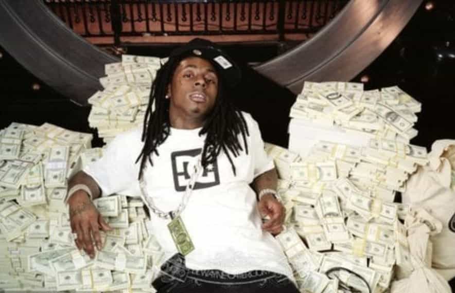 Lil wayne sitting on money