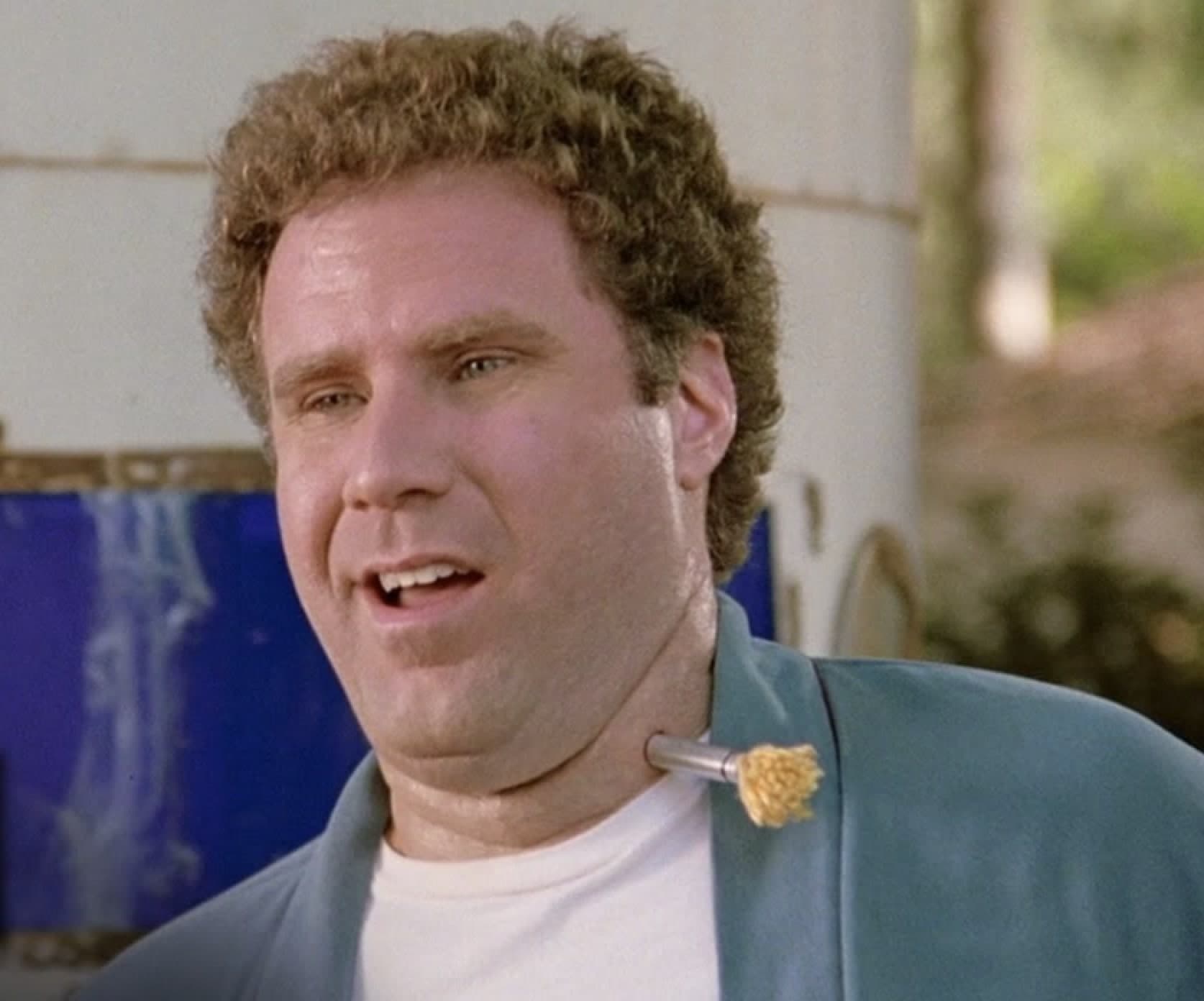Will Ferrell with tranquilizer dart in his neck