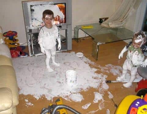 two kids covered in paint