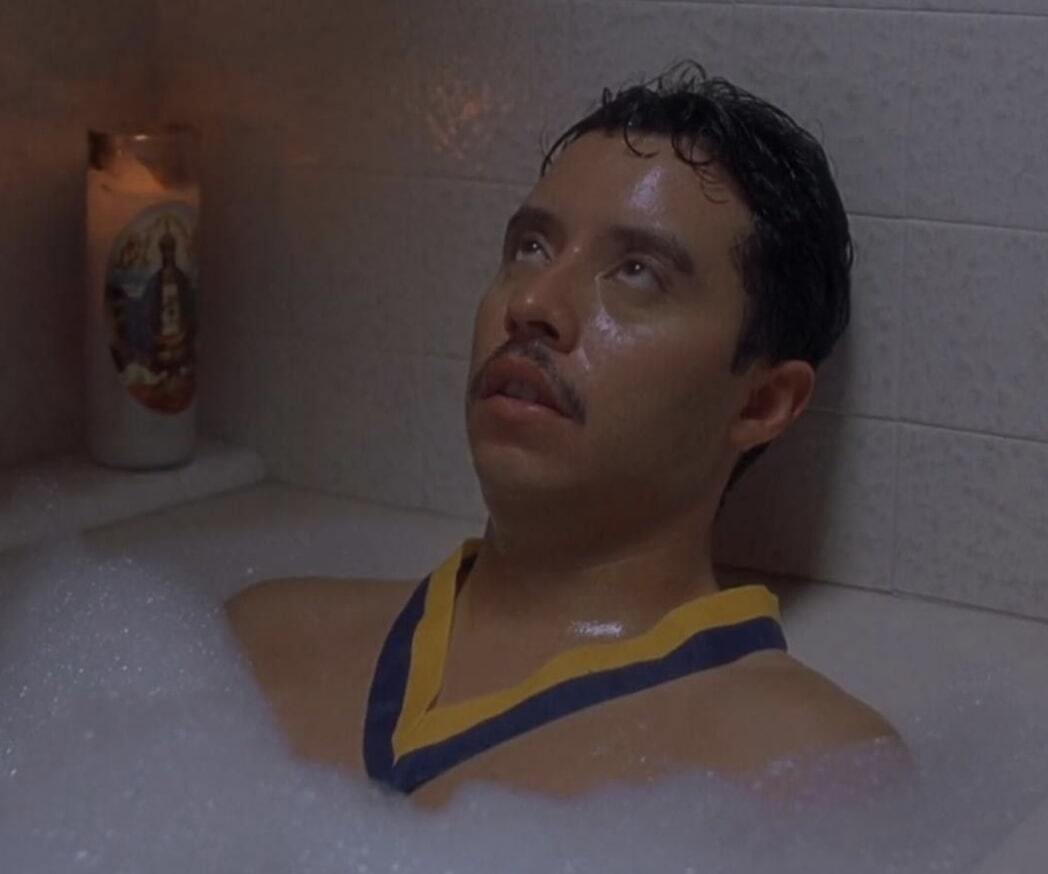 Pedro from Napoleon Dynamite sitting in the bath rolling his eyes