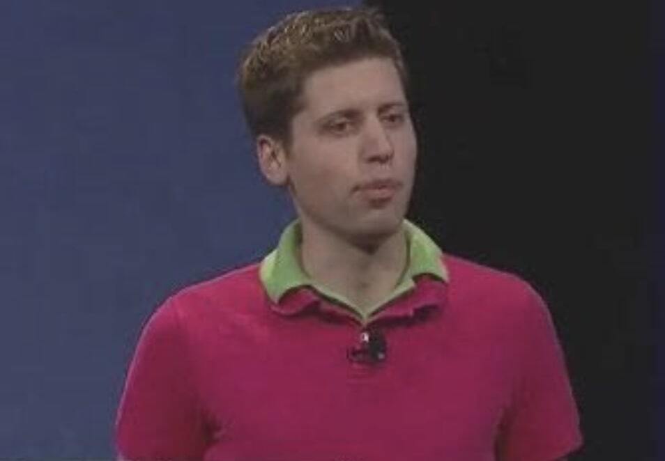 Sam Altman looking confused while giving a talk