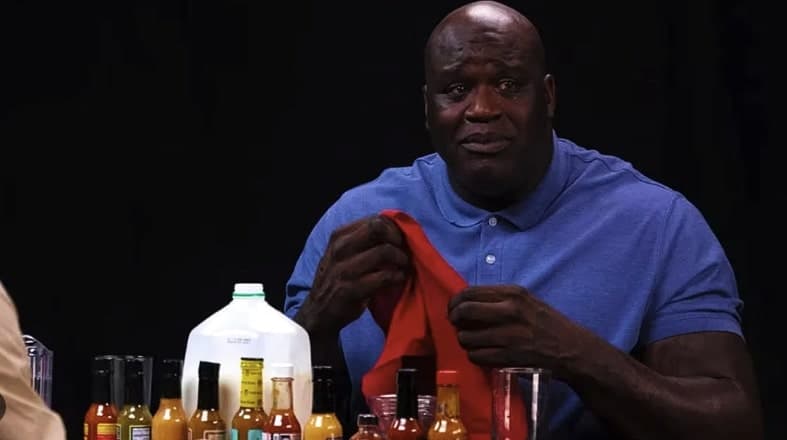 Shaq crying while eating hot wings