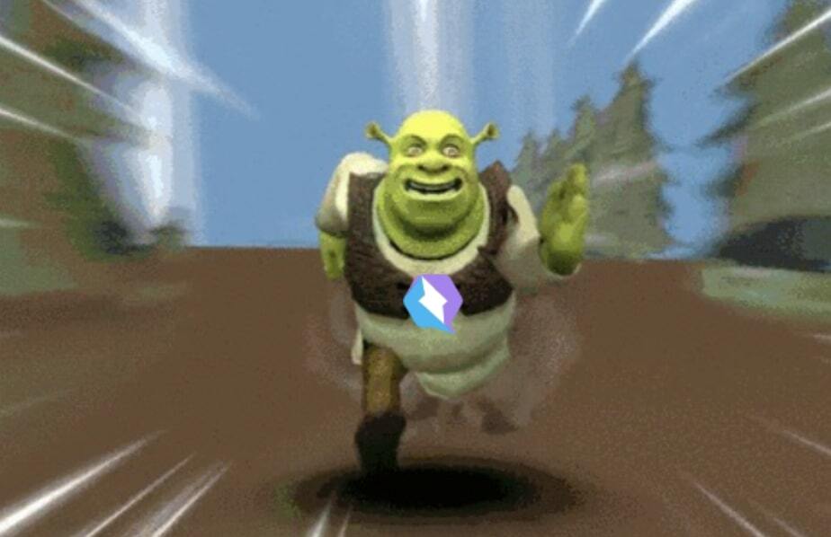 Shrek running with a Qwik logo on his chest