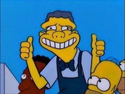Simpsons character smiling painfully
