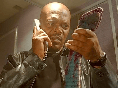 Samuel L. Jackson holding a snake.. on a plane