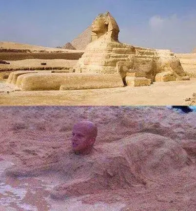 The real Sphinx statue next to a guy in a Sphinx sand castle