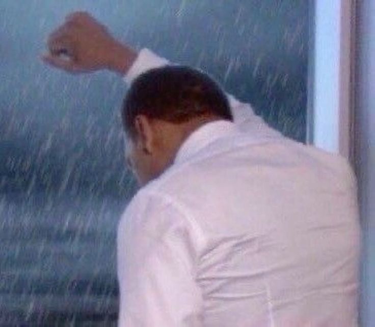 Stephen A Smith sad looking out a rainy window
