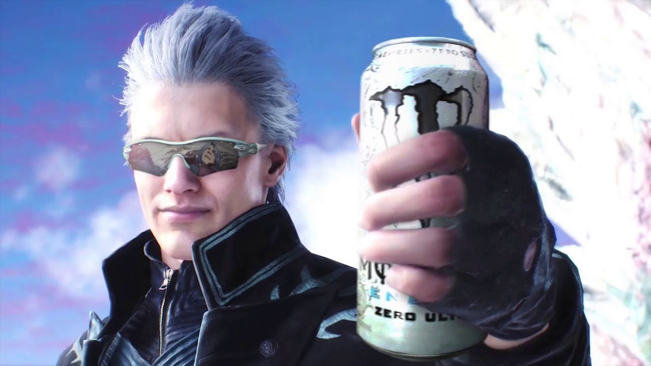 White-haired man in sunglasses holds up a can of white Monster Energy