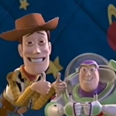 Woody and Buzz cringe smiling and giving thumbs up
